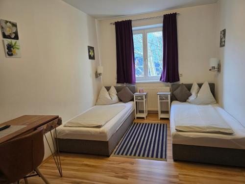 Postel nebo postele na pokoji v ubytování Hotel Hafnerwirt