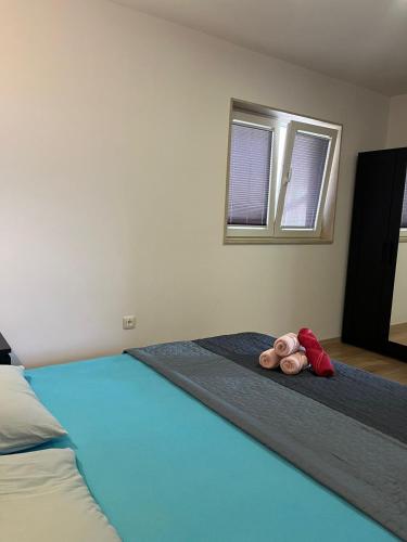 Postel nebo postele na pokoji v ubytování Apartman Mrva