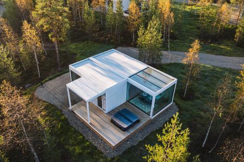 an overhead view of a house with a car in it at Northern Lights Ranch in Levi