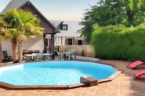 Villa charmante dans les vergers de Normandie avec piscine privée.