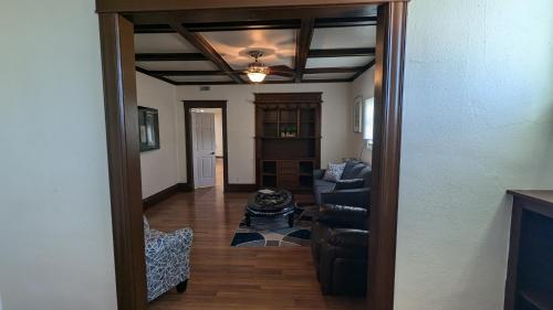 a living room with a couch and a ceiling at Koreana in Decorah in Decorah