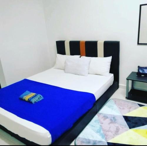 Ένα ή περισσότερα κρεβάτια σε δωμάτιο στο RelaksHomestay51