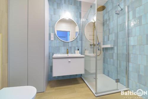Ένα μπάνιο στο Apartamenty BalticOn Polanki Aqua parking inclusive