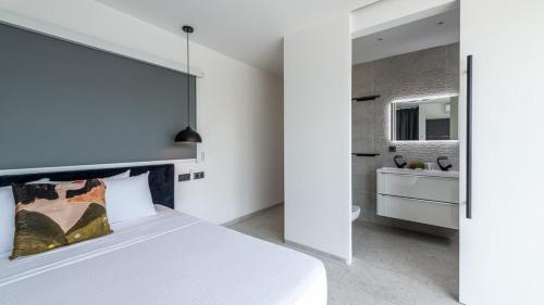 Ένα ή περισσότερα κρεβάτια σε δωμάτιο στο Villa Sea View Luxury