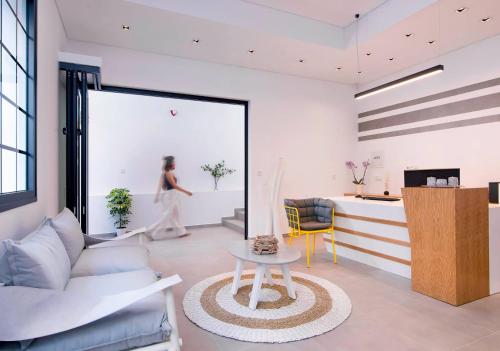 Ruang duduk di Cozy Suites Potos
