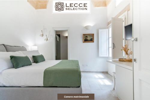 Postel nebo postele na pokoji v ubytování Tancredi Suites - Lecce Selection