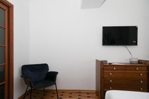 TV a/nebo společenská místnost v ubytování Clos du Pinot by Hili