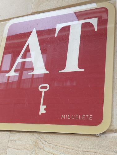 a sign on the side of a building at Miguelete in Selaya