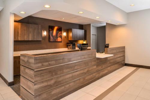 a lobby of a hotel with a reception desk at Residence Inn by Marriott Branson in Branson
