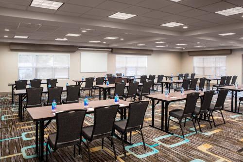a conference room with tables and chairs in it at Residence Inn by Marriott Cypress Los Alamitos in Los Alamitos