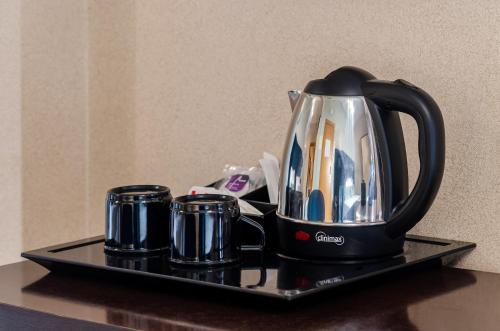Set per la preparazione di tè e caffè presso Hotel DAH - Dom Afonso Henriques