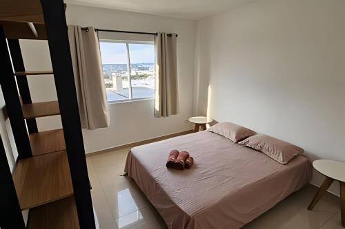 Postel nebo postele na pokoji v ubytování Condomínio com vista da Serra do Mar