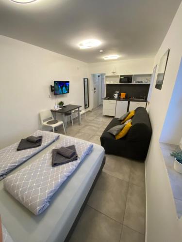 Postel nebo postele na pokoji v ubytování Apartmán HARMONY - Lipno nad Vltavou