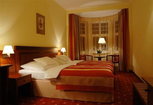 Postel nebo postele na pokoji v ubytování Hotel Villa