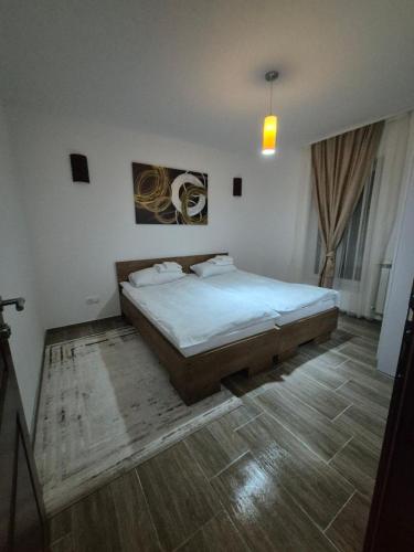 a bedroom with a large bed in a room at Bjance Lux Prijepolje in Prijepolje