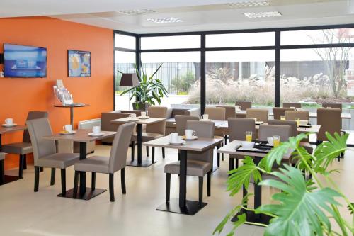 Εστιατόριο ή άλλο μέρος για φαγητό στο Appart Hotel Odalys City Tours Le Jardin des Lettres