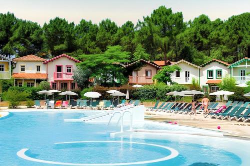 Maison confortable à Lacanau avec piscine partagée