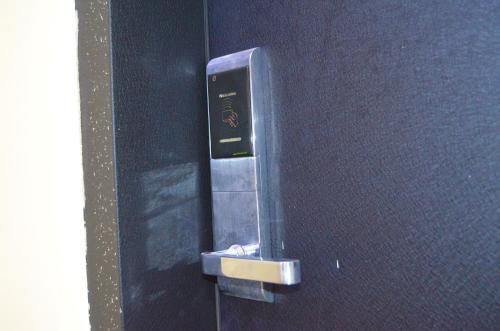 a metal box on the side of a wall at Residency Apartment and Hotel Guzape Hills Abuja in Abuja