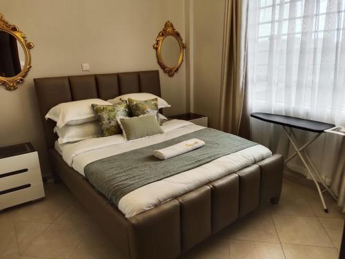 Giường trong phòng chung tại Zoe Homes 1 bedroom Apartment NAIVASHA REHEMA HOMES -F207
