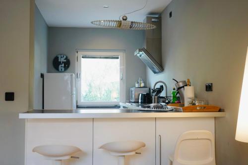 Η κουζίνα ή μικρή κουζίνα στο Maisonettewohnung in TOP Lage