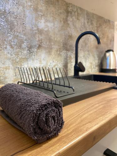 a towel sitting on top of a kitchen counter at Altiora in Subotica