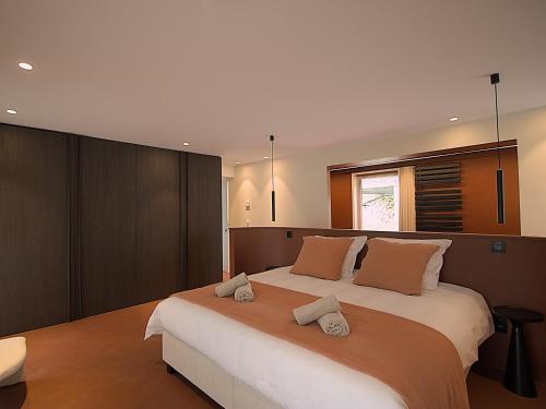 Postel nebo postele na pokoji v ubytování B&B De Alffarhoeve