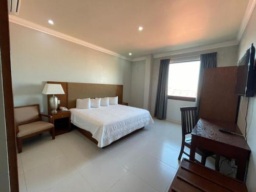 Ένα ή περισσότερα κρεβάτια σε δωμάτιο στο Hotel Villa Montes
