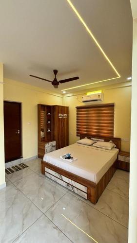 Postel nebo postele na pokoji v ubytování Hawa Residency