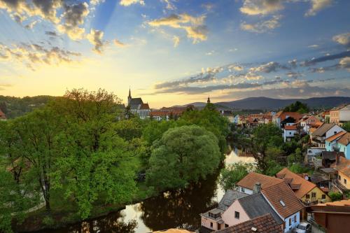 a view of a town with a river at Penzion Prelat in Český Krumlov
