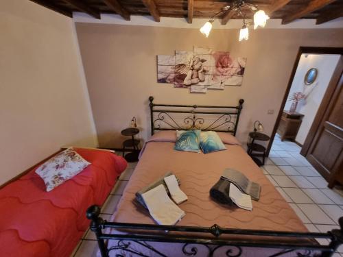 Cama o camas de una habitación en La casetta della fontanella