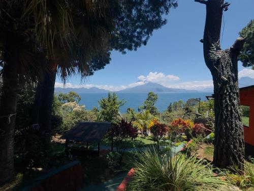a view of the ocean from the garden at Hanna Suites in Panajachel
