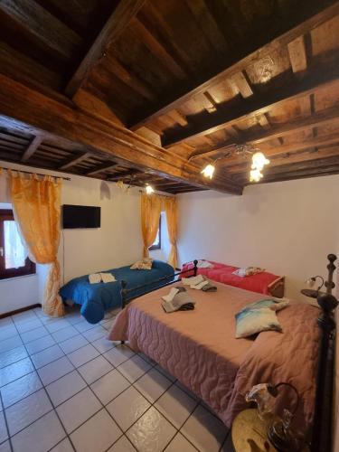 Cama o camas de una habitación en La casetta della fontanella