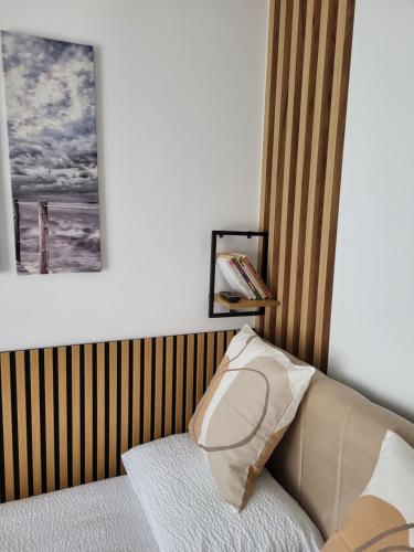 Ένα ή περισσότερα κρεβάτια σε δωμάτιο στο Apartman Karolina