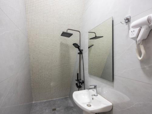 Ένα μπάνιο στο Quba Cozy House