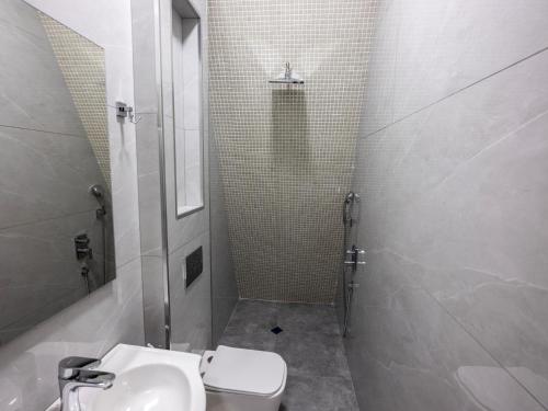 Ένα μπάνιο στο Quba Cozy House