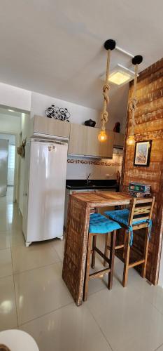 Kuchyň nebo kuchyňský kout v ubytování Apartamento Lindo Frente Mar