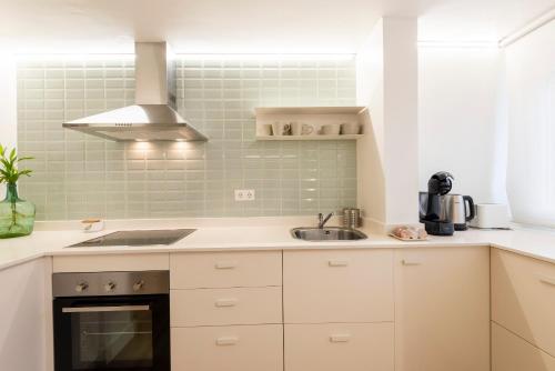 Η κουζίνα ή μικρή κουζίνα στο Apartamento 42 1 hab 140m Playa Caneliñas Máx 3 pax