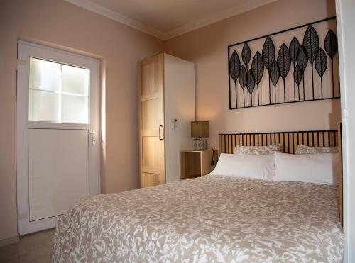 Ένα ή περισσότερα κρεβάτια σε δωμάτιο στο Villa Serenity Panoramic View