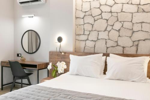 Ένα ή περισσότερα κρεβάτια σε δωμάτιο στο ridos house