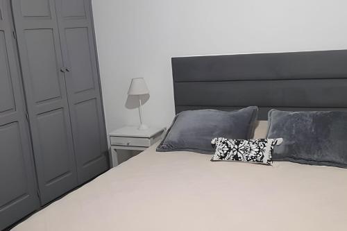 Ein Bett oder Betten in einem Zimmer der Unterkunft Propiedad 139m2 en Casco Histórico