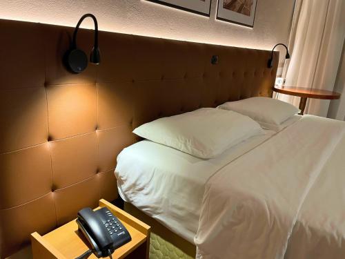 Hotel Neloにあるベッド