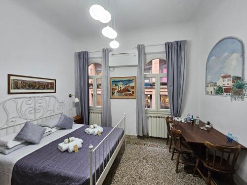 Posteľ alebo postele v izbe v ubytovaní Florence Signoria Apartment