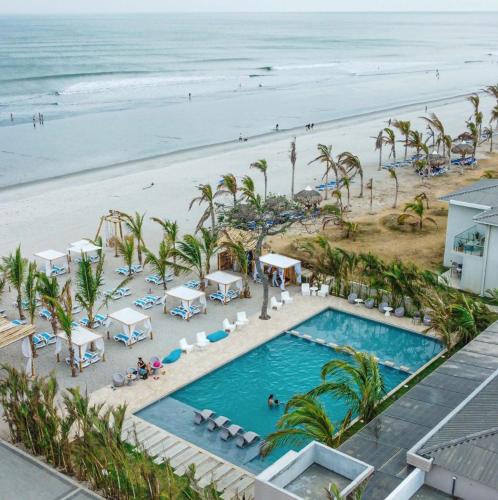an overhead view of a pool and the beach at Beach Home at Playa Caracol in Chame