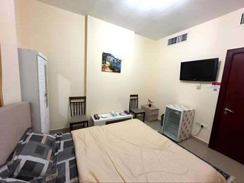 TV a/nebo společenská místnost v ubytování MBZ - Master Room
