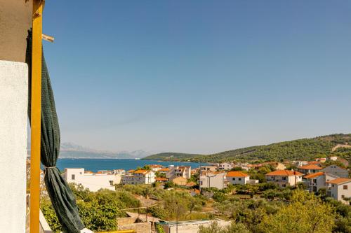 a view of a city from a building at Apartments Naki in Slatine