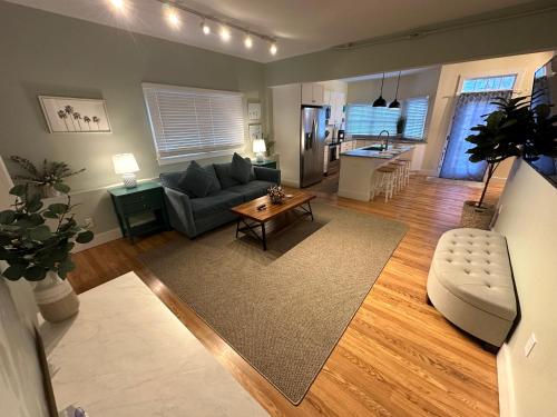 a living room with a couch and a table at 86 Dr Marcus House - Popular Broadway Area in Newport