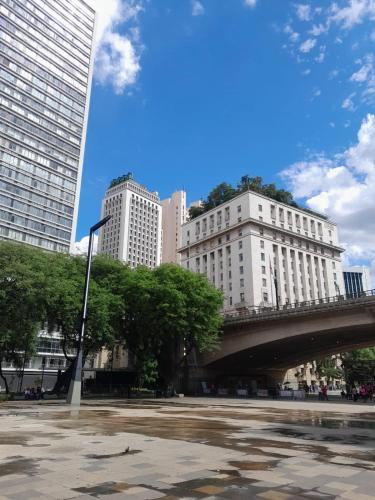 a bridge in a city with tall buildings at Excelente apto Centro SP - Tudo a pé in Sao Paulo