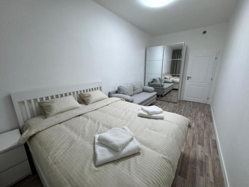 Posteľ alebo postele v izbe v ubytovaní Modern, comfortable apartments near the metro