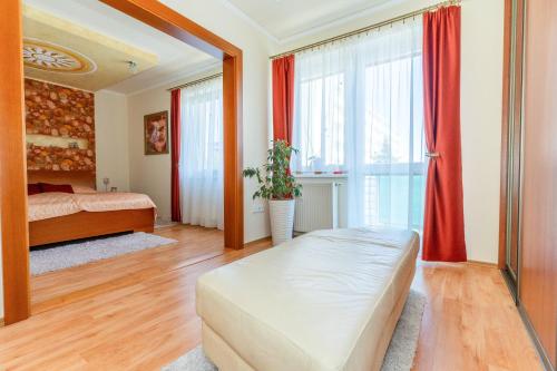 Postel nebo postele na pokoji v ubytování TOP KOMFORT ubytovanie v blízkosti centra