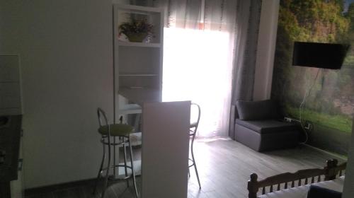 Ruang duduk di Apartments and Room Rest